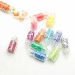 Merkloos 48 Potjes Glitter / Decoratie Voor Nail Art / Knutselen - Glitters Nagel Decoratie Set- 3D Nail Art Voor Gellak, Acryl Of Nagellak - Glitter, Poeder, Holografisch, Vlokken, Pailletten, Shimmer, Rhinestone - Verschillende Kleuren -L’Oréal Paris SHOP 550x499 5